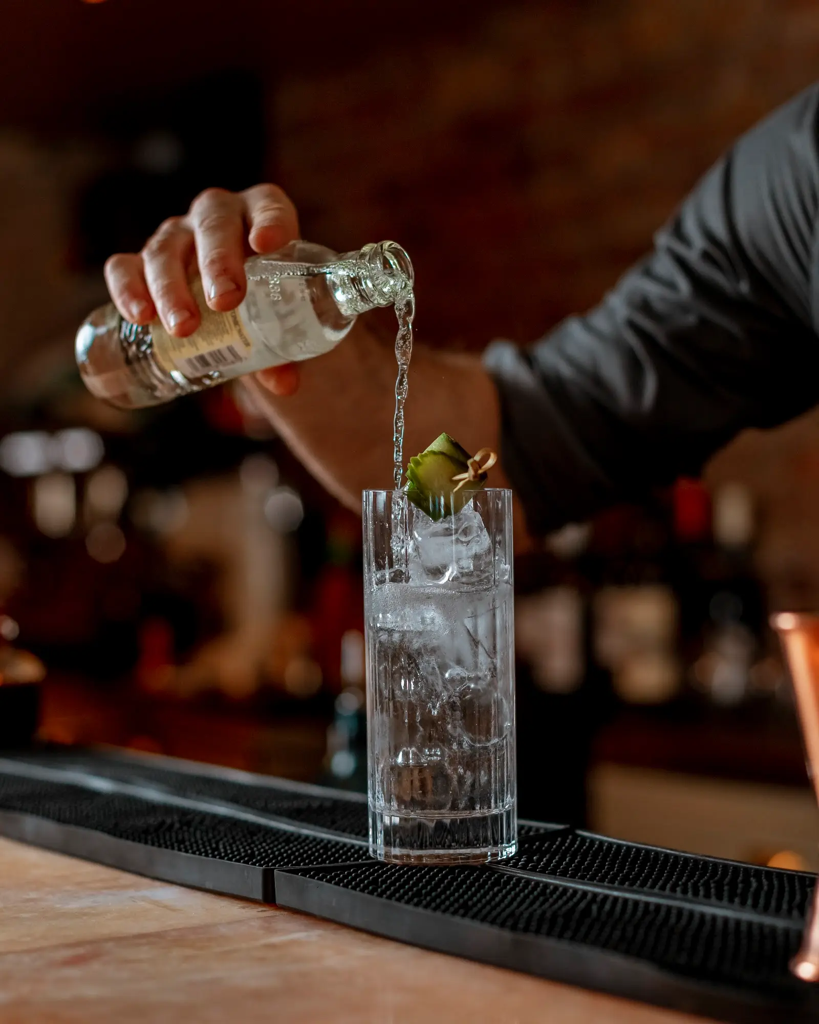 A gin and tonic being poured at the Teatro bar